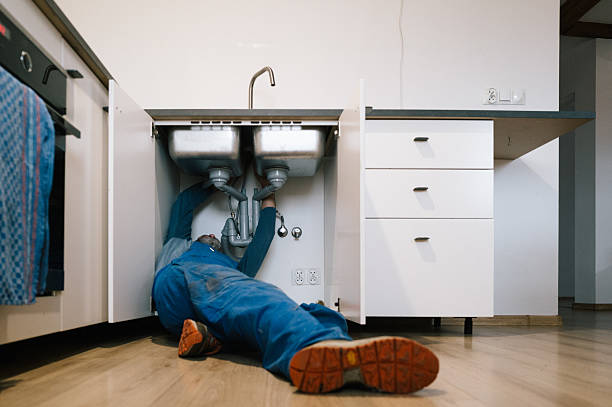 Professional Drain Cleaning technician working in Liberty, MO